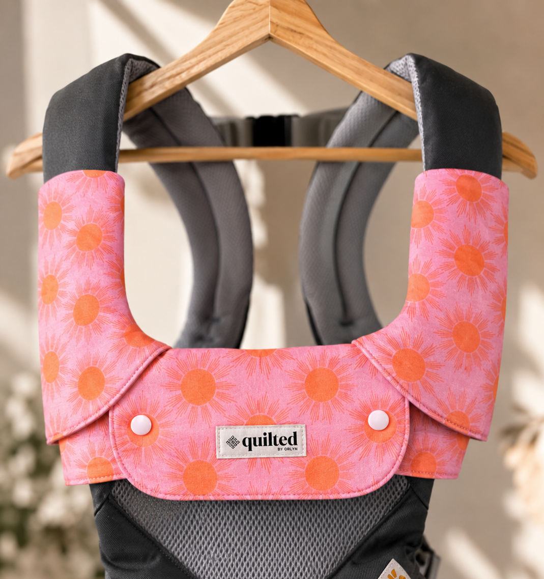 Reversible babywearing strap covers to protect carrier shoulder straps