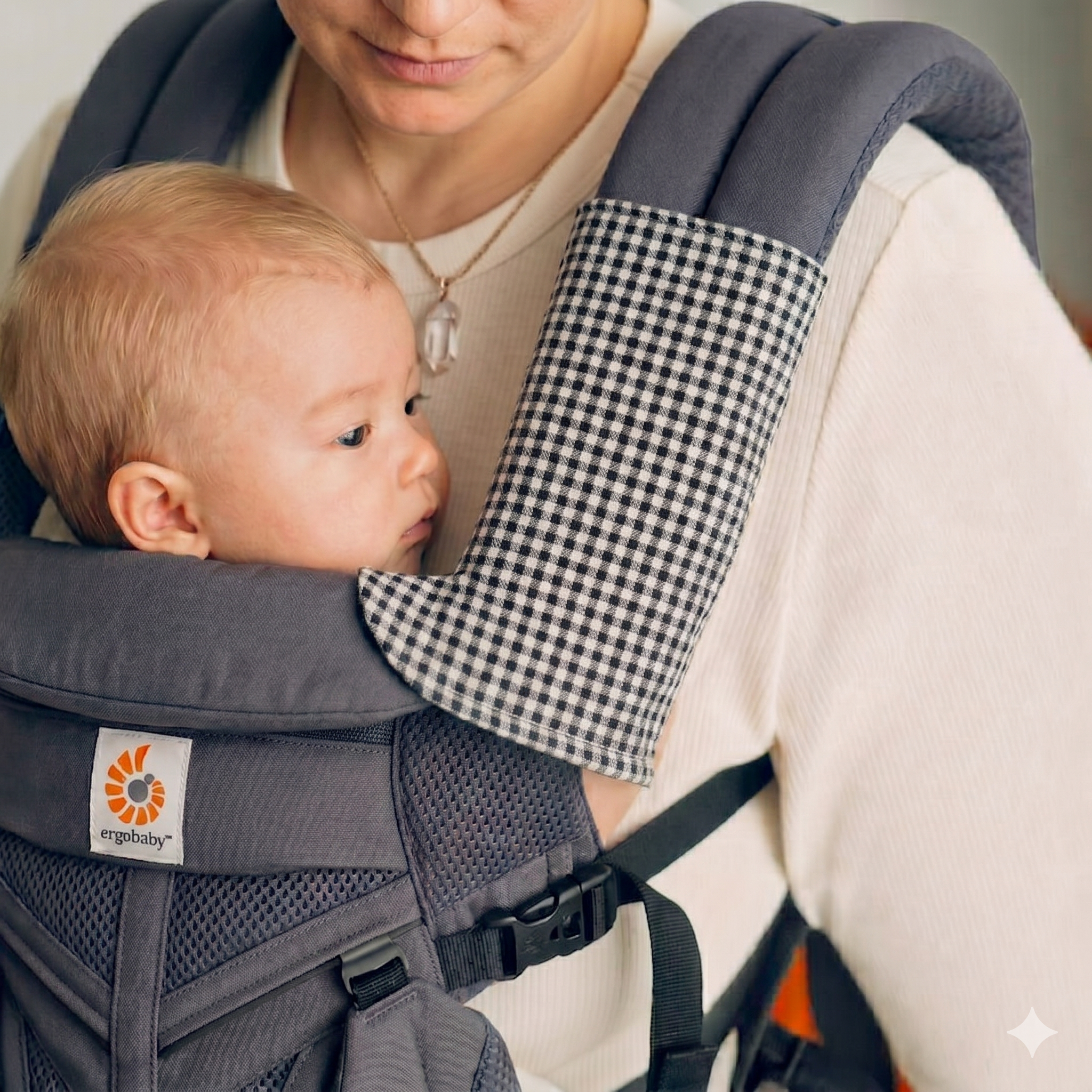 Babywearing accessories including absorbent suckpads and strap protectors