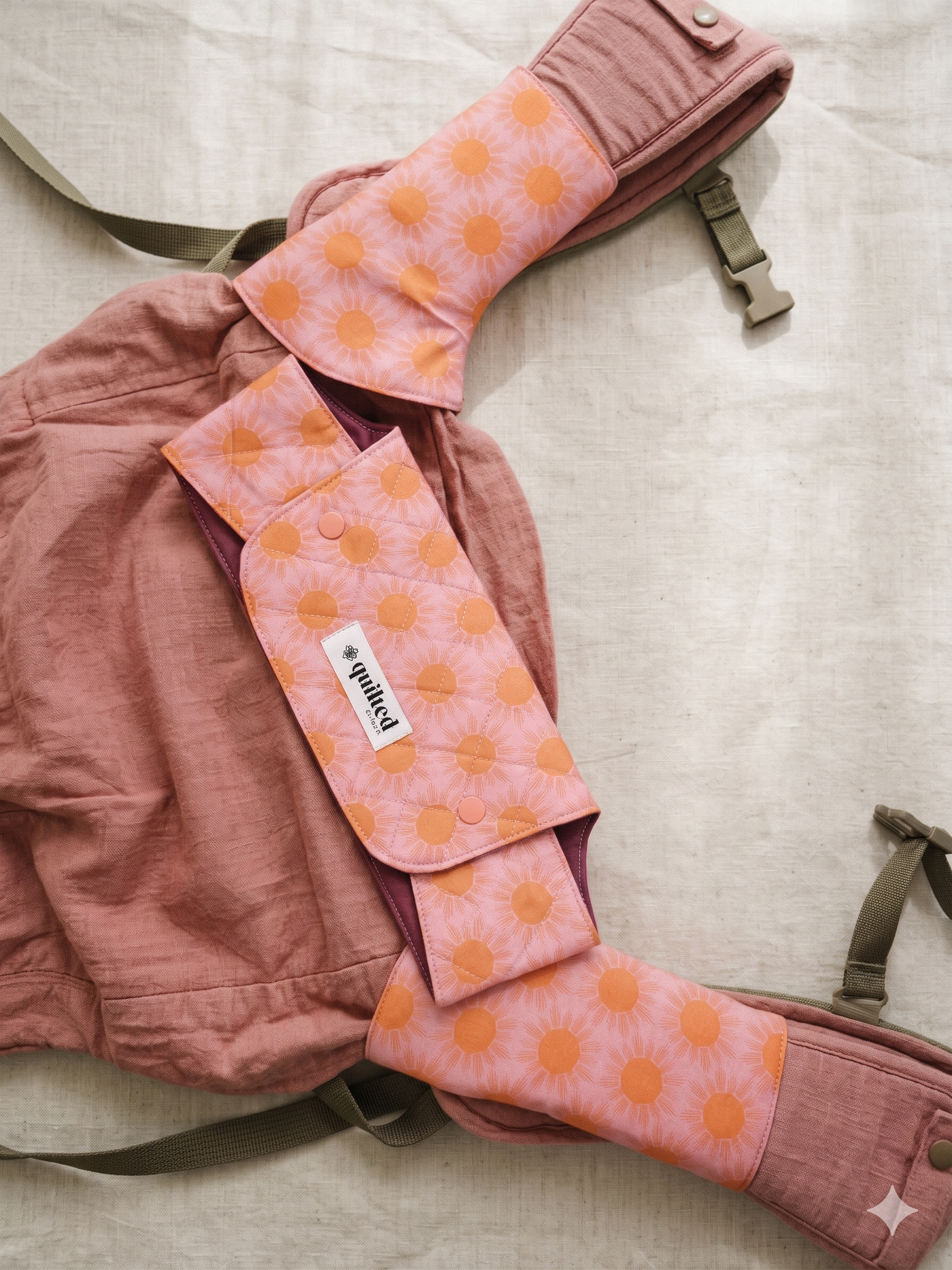 Baby carrier suckpads made from soft cotton fabric for teething babies pink starburst fabric bramble